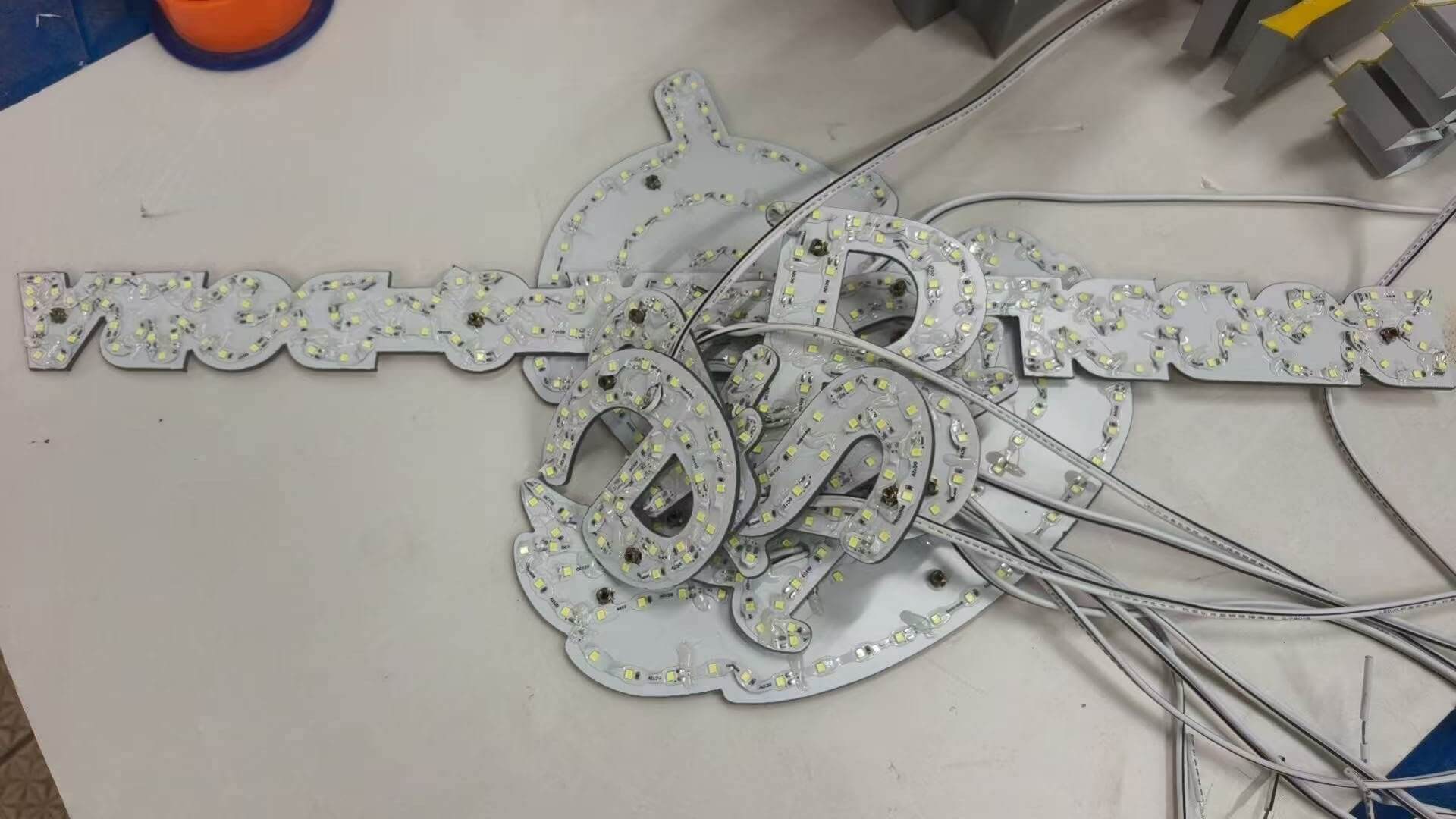 Internal LED circuit layout with pure copper PCB strips at EndPoint Sign's Guangzhou plant