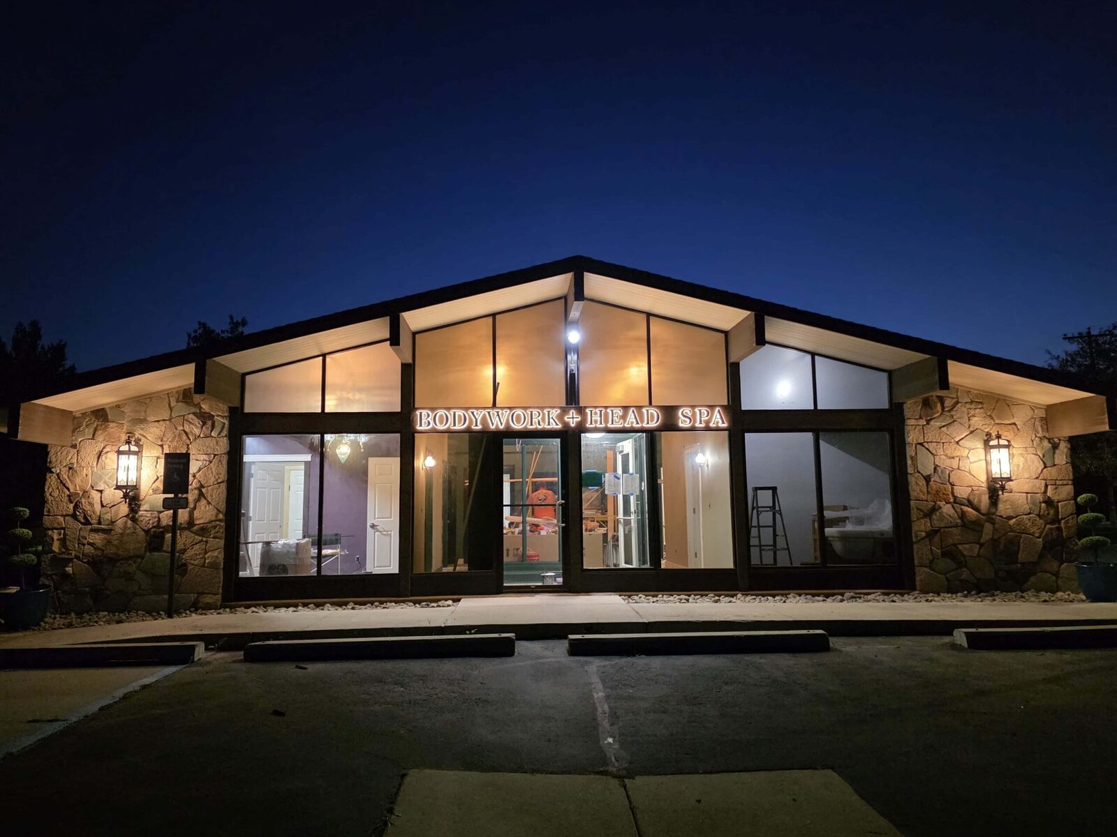 Storefront facade before installing custom illuminated sign for spa