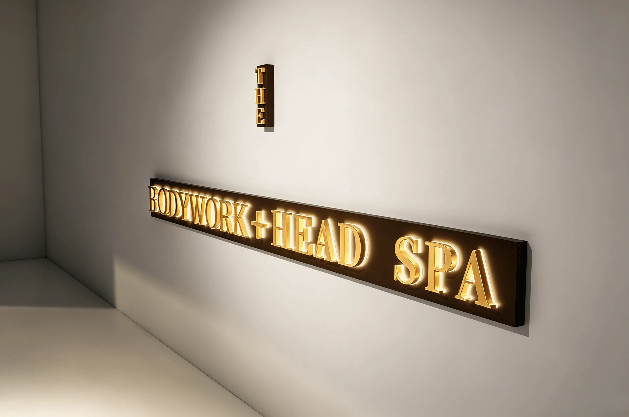 Brushed satin gold architectural halo lettering