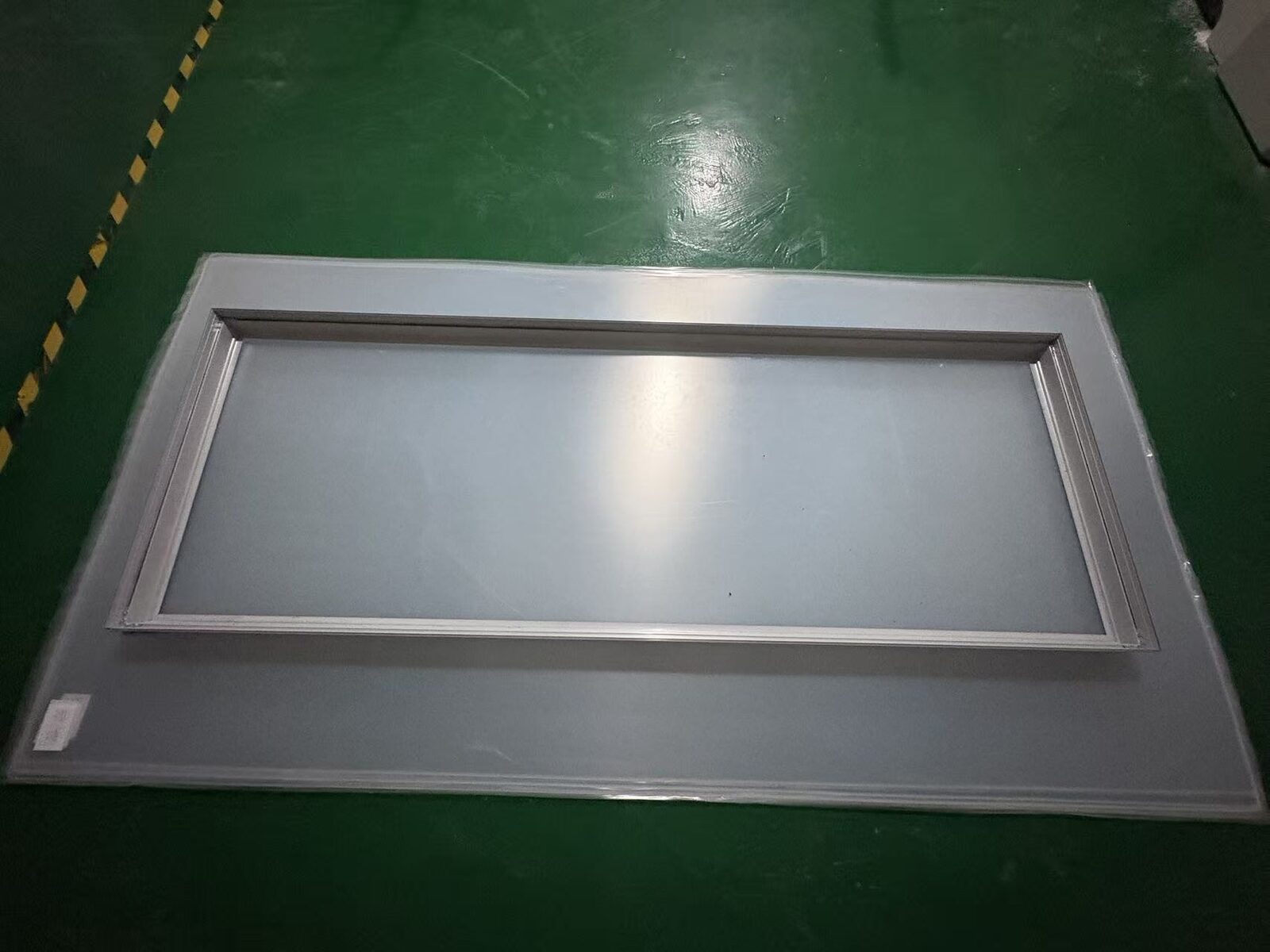 Custom SEG fabric light box frame extrusion assembly at EndPoint Sign's Guangzhou plant
