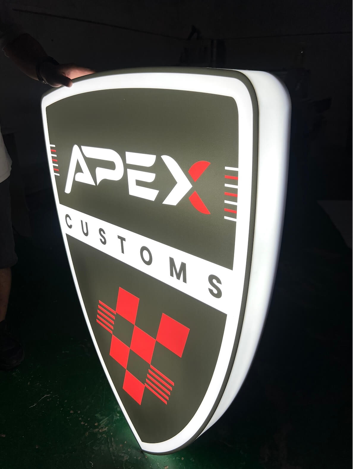 Custom shield light box sign factory quality inspection at EndPoint Sign's Guangzhou plant