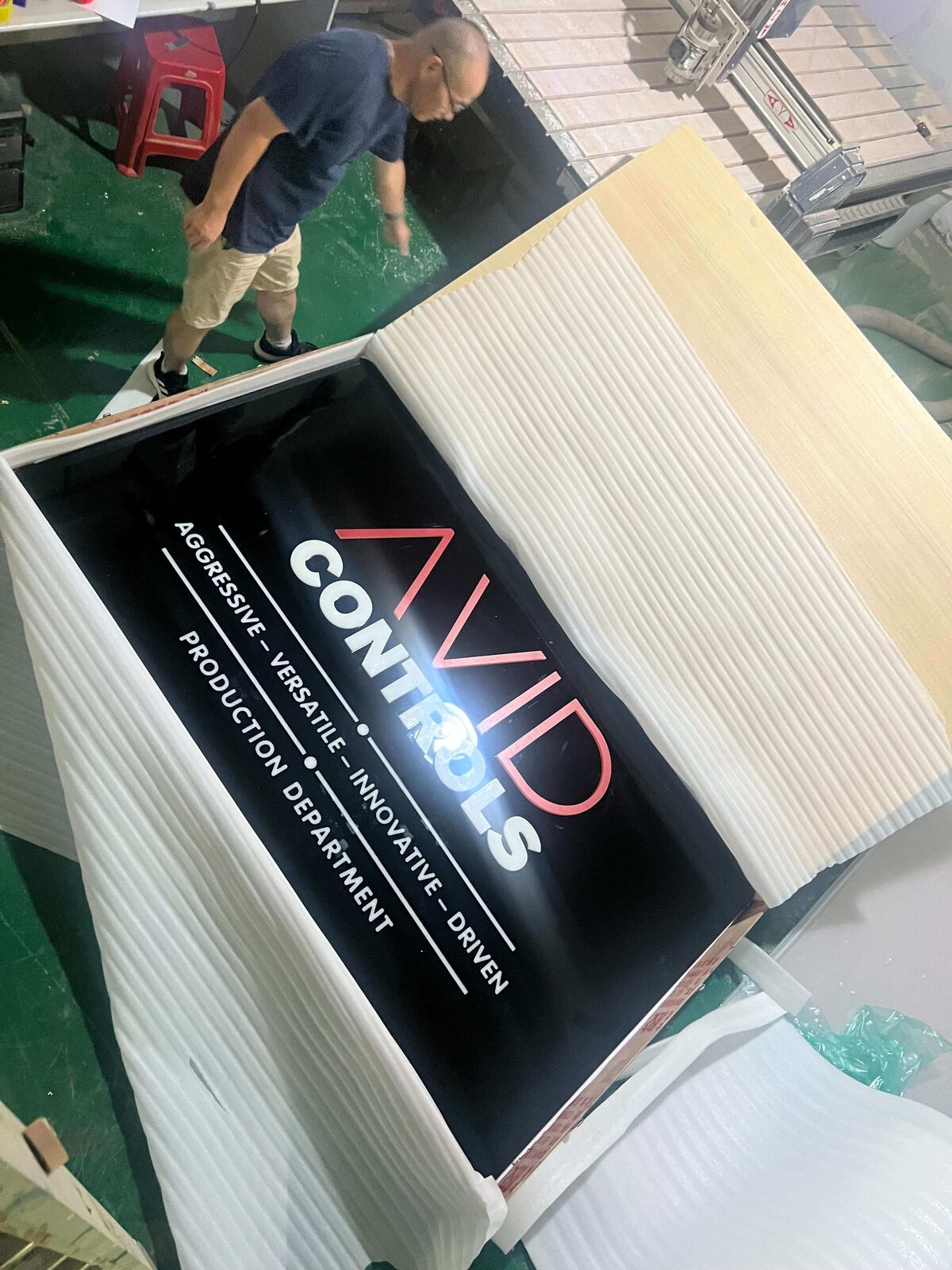 Damaged backlit channel letters showing crack across middle acrylic face
