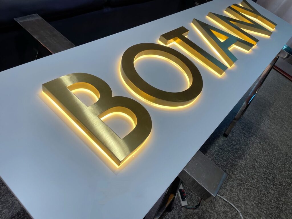 BOTAN gold 3D acrylic letters on a facade