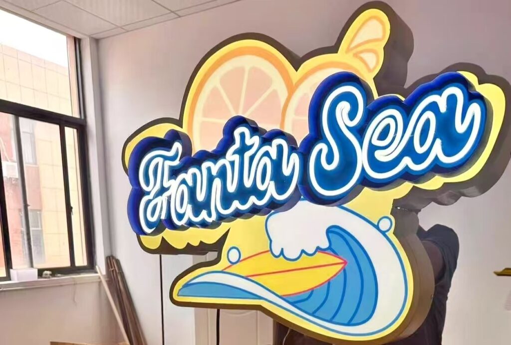 Custom SEG fabric light box with a printed shaped face for Fanta Sea