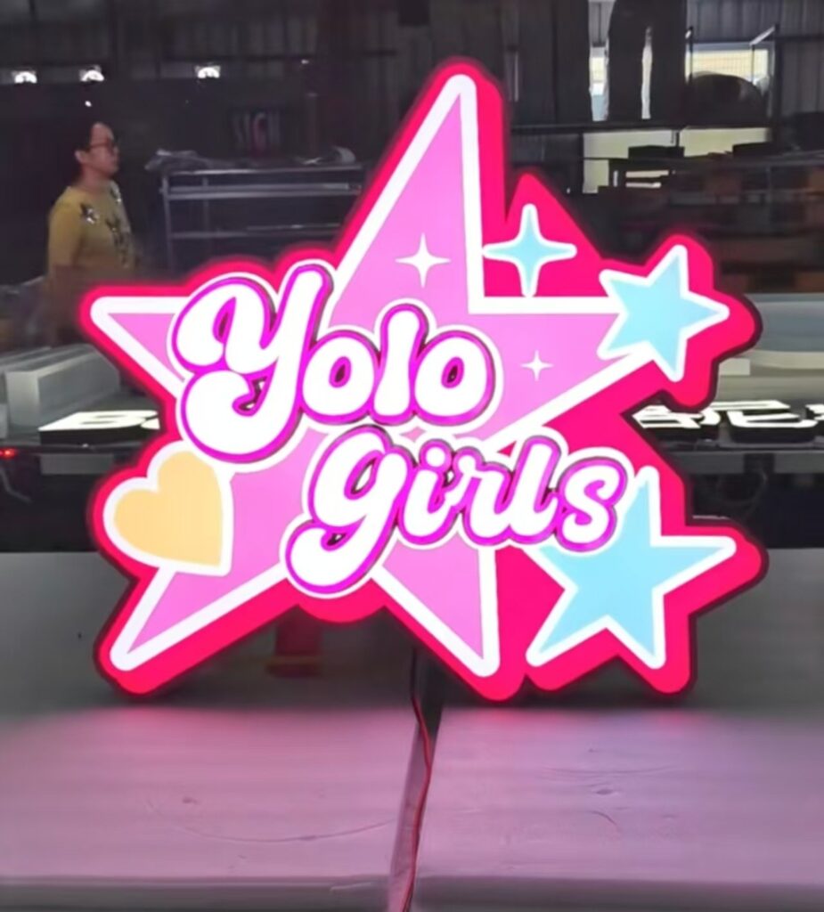Yolo Girls star shaped light box sign
