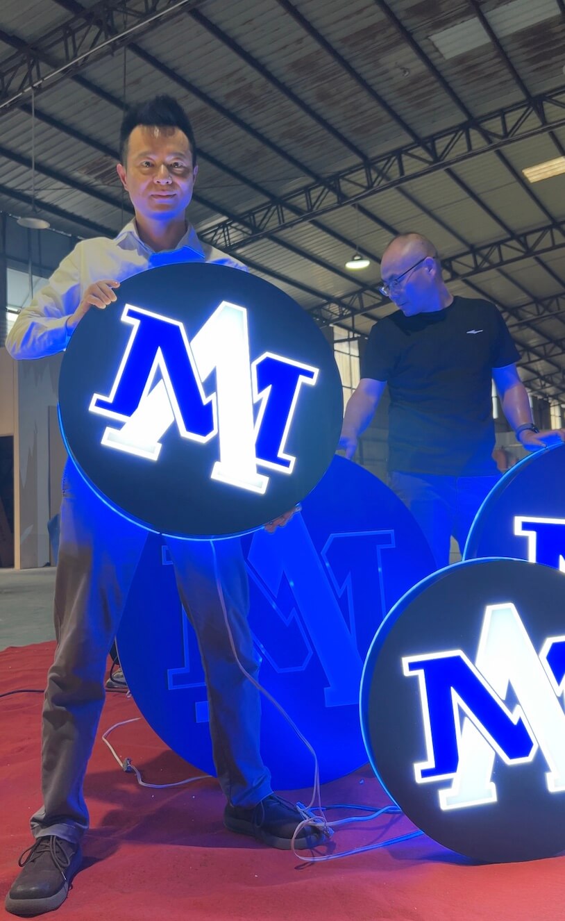 Custom halo-lit round signs and round LED signs finished for an educational institution in New York
