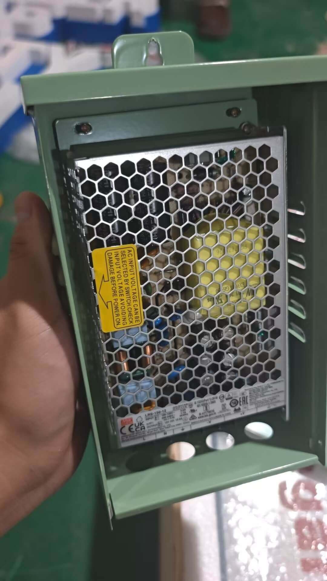Weatherproof power supply setup inside stainless steel box for custom blade sign