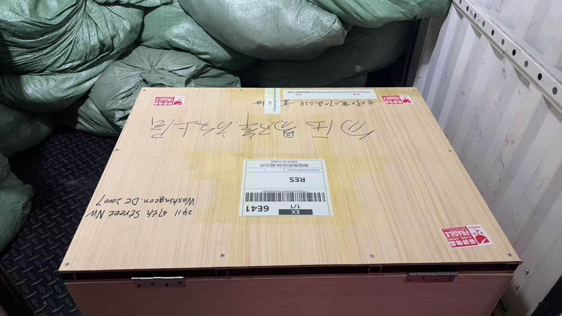 Wooden crate packaging for custom double-sided blade sign ready for export